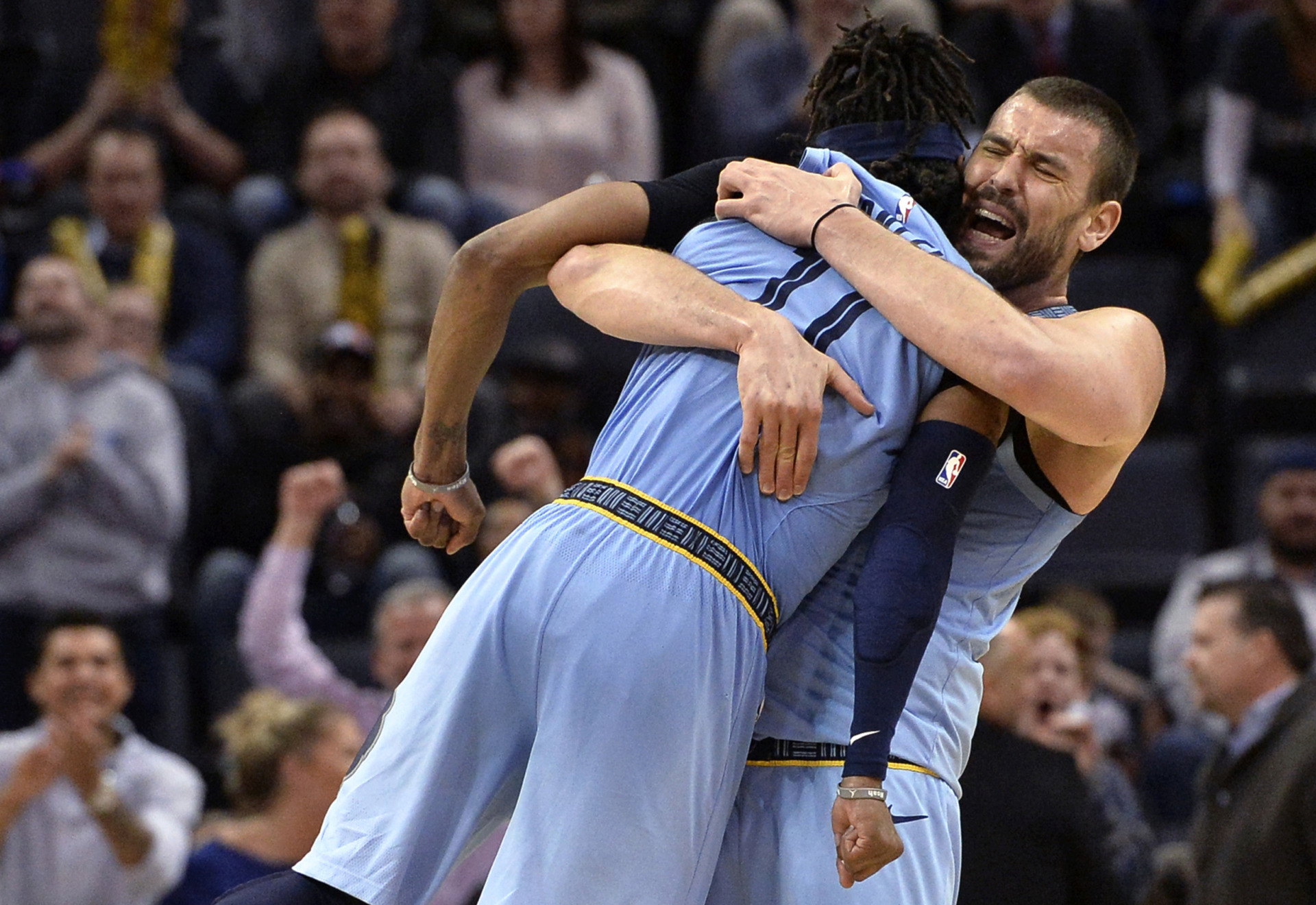 <strong>Memphis Grizzlies center Marc Gasol lifts guard Mike Conley (11) as they celebrate in the second half of a game against the Indiana Pacers on Jan. 26, 2019, in Memphis.</strong> (AP Photo/Brandon Dill)