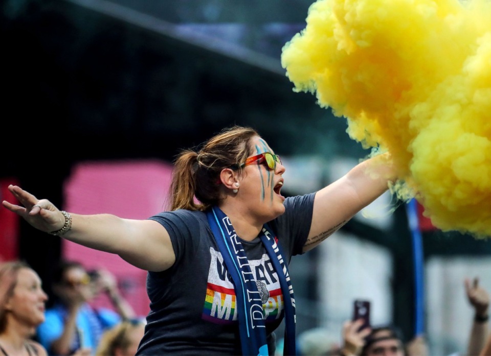 <strong>A member of the Bluff City Mafia fires up a smoke bomb before the Memphis 901 FC's Sept. 1 match against Oklahoma.</strong> (Patrick Lantrip/Daily Memphian)