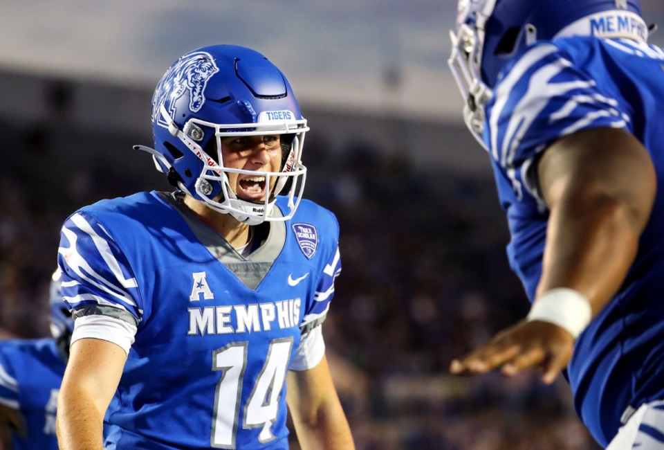 <strong>University of Memphis quarterback Seth Henigan celebrates after a touchdown during a Sept. 4, 2021 game against Nicholls State at Liberty Bowl Memorial Stadium.</strong> (Patrick Lantrip/Daily Memphian)