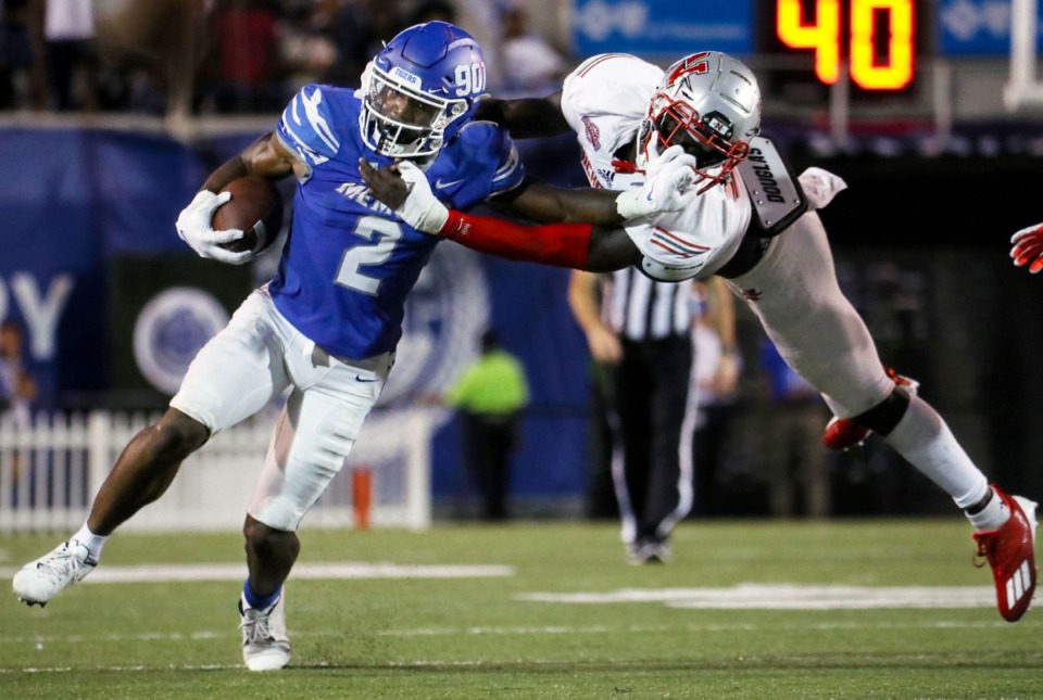 <strong>University of Memphis running back Rodrigues Clark (2) breaks a tackle during a Sept. 4, 2021 game against Nicholls State at Liberty Bowl Memorial Stadium.</strong> (Patrick Lantrip/Daily Memphian)