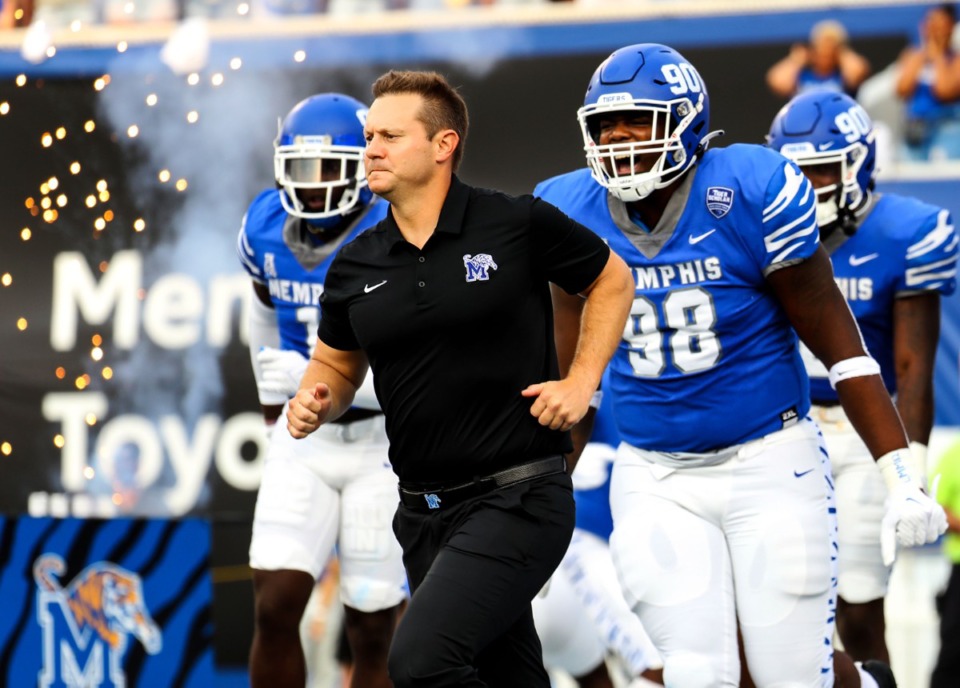 <strong>University of Memphis head coach Ryan Silverfiled leads his players onto the field before a Sept. 4, 2021 game against Nicholls State at Liberty Bowl Memorial Stadium.</strong> (Patrick Lantrip/Daily Memphian)