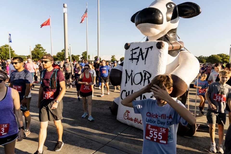<strong>Participants head towards the starting line for the 18th Annual Chick-fil-A 5K benefitting My Town Miracles at Tiger Lane on Sept. 6, 2021.</strong> (Brad Vest/Special to The Daily Memphian)