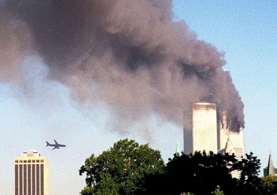 <strong>A plane approaches New York's World Trade Center moments before it struck the tower at left, on Tuesday, Sept. 11, 2001.</strong> (William Kratzke/Associated Press file)