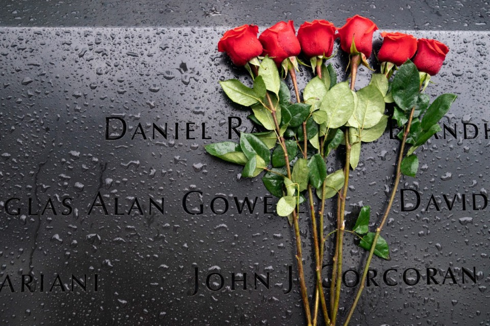 <strong>Red roses rest against the names of the fallen on the south pool at the National September 11 Memorial &amp; Museum, Thursday, Sept. 9, 2021, in New York.</strong> (John Minchillo/AP)