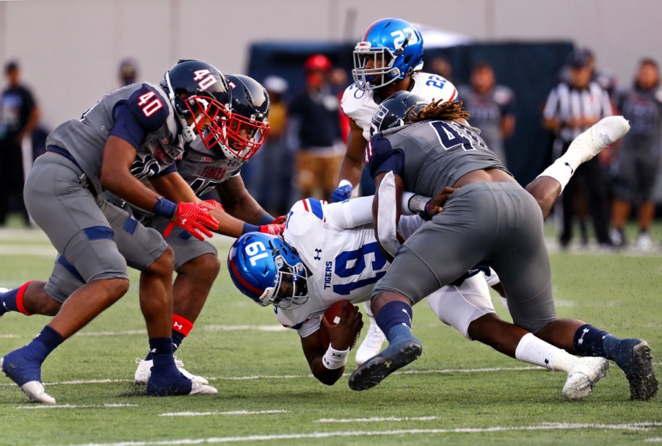 <strong>Tennessee State quarterback Geremy Hickbottom (19) gets sacked during the Southern Heritage Classic in Memphis, Tennessee Sept. 11, 2021.</strong> (Patrick Lantrip/Daily Memphian)
