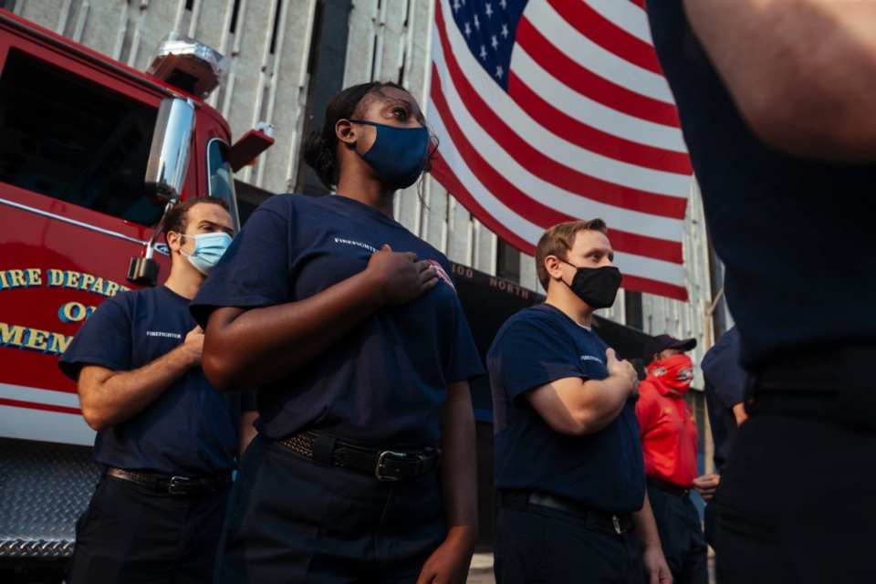 <strong>Memphis Fire Services Divisions pledge allegiance to the flag during a 9/11 rememberance service in Downtown Memphis, Saturday, Sept. 11, 2021.</strong> (Ziggy Mack/Special to The Daily Memphian)