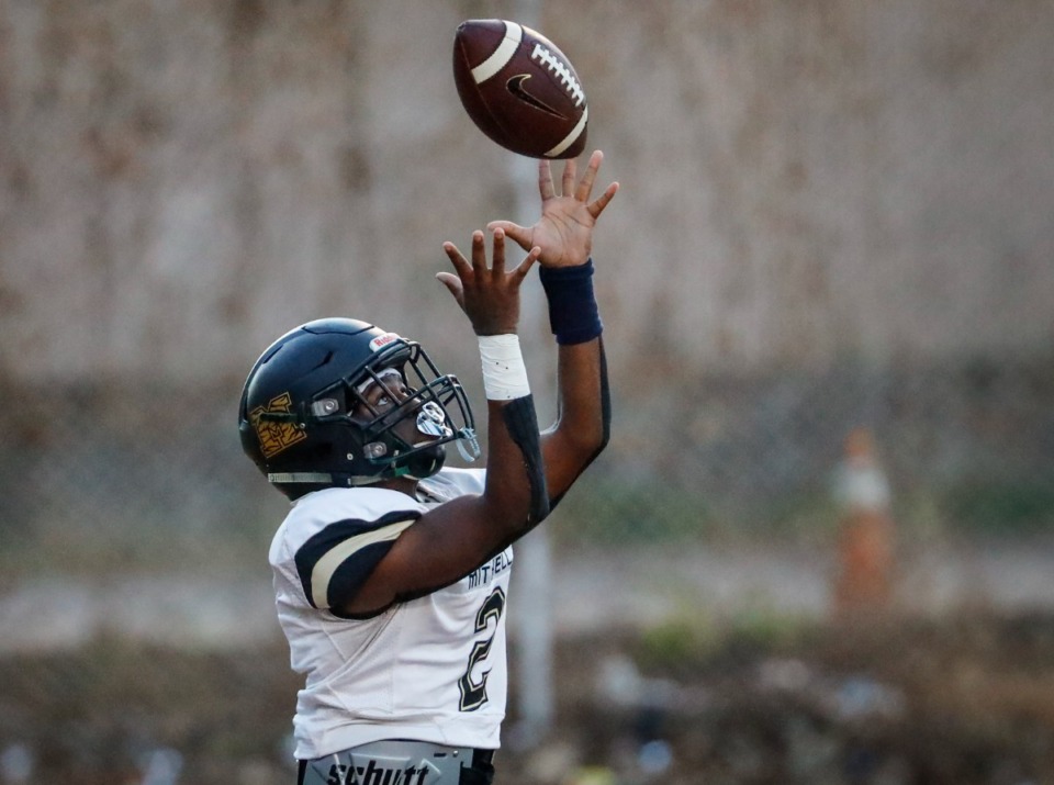 <strong>Mitchell quarterback Antonio Jenkins grabs a high snap in the game against MAHS on Thursday, Sept. 16, 2021.</strong> (Mark Weber/The Daily Memphian)