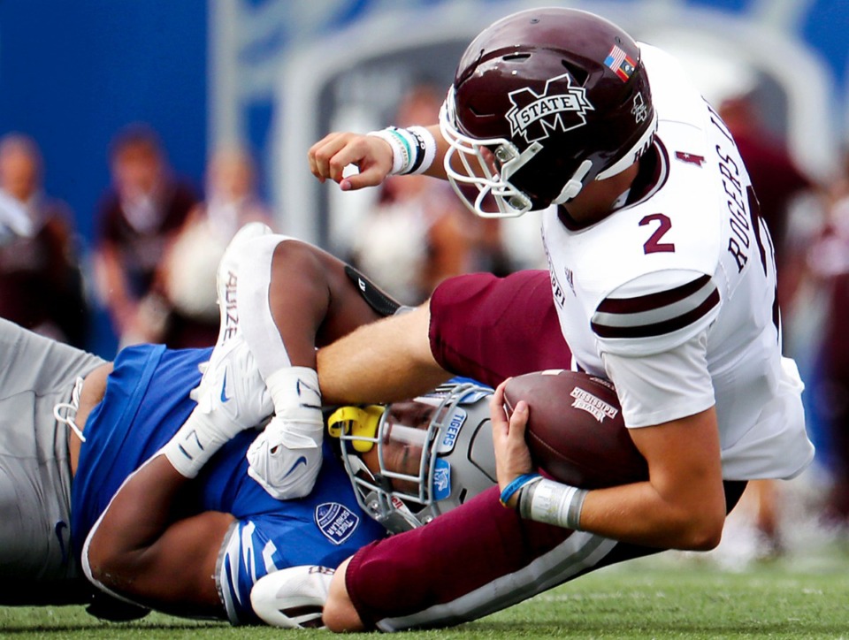 <strong>University of Memphis defensive lineman Maurice White (4) sacks Mississippi State University quarterback Will Rogers III (2) during a Sept. 18, 2021 game at the Liberty Bowl Memorial Stadium.</strong> (Patrick Lantrip/Daily Memphian)