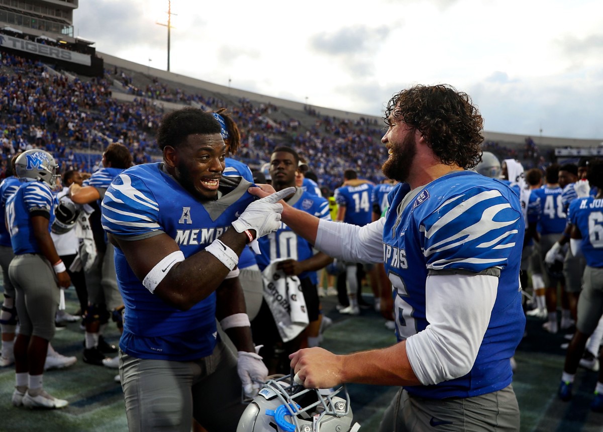 <strong>University of Memphis players celebrate after the victory over Mississippi State University.</strong> (Patrick Lantrip/Daily Memphian)