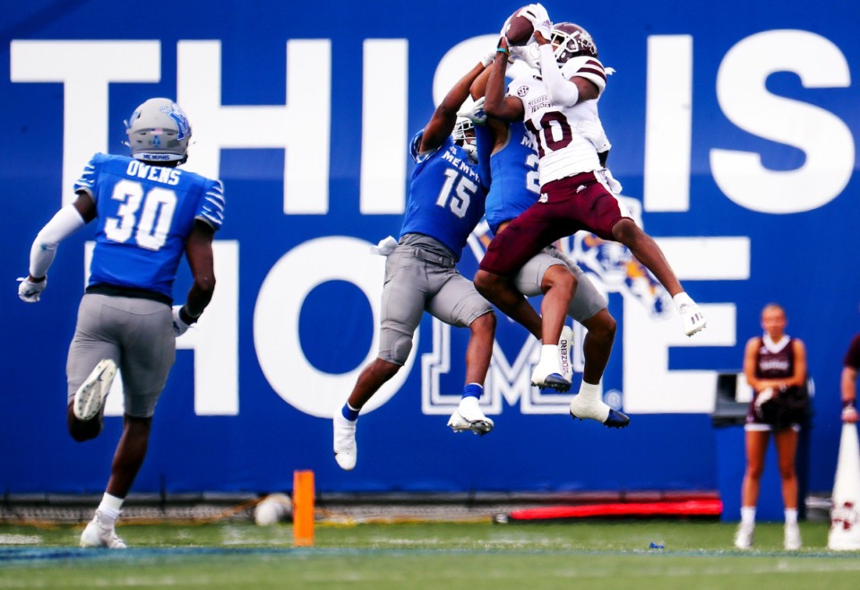 <strong>University of Memphis defensive back Quindell Johnson (15) aims to block a catch by Mississippi State wide receiver Makai Polk (10).</strong> (Patrick Lantrip/Daily Memphian)