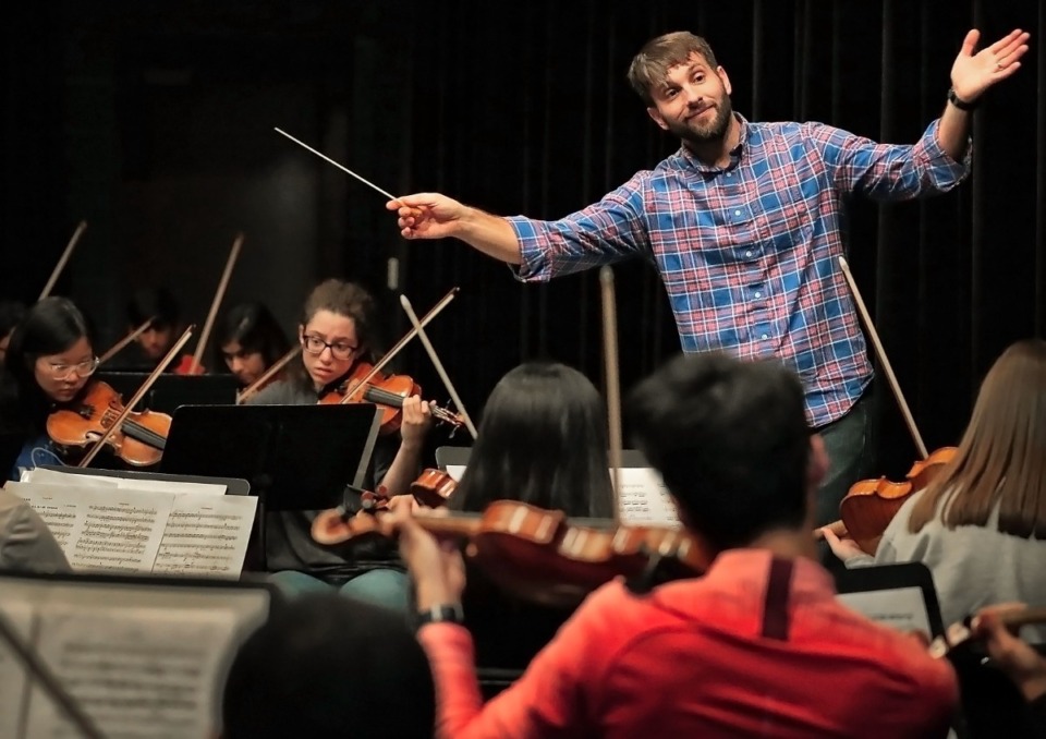 <strong>Artistic Director Jonathan Schallert leads the GPAC Youth Symphony during a rehearsal at the Germantown Performing Arts Center on Nov. 9, 2019.</strong> (Daily Memphian file)