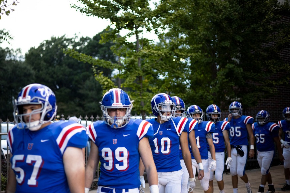 <strong>The MUS football team walks toward the field before the start of Friday night&rsquo;s game against Ridgeway.</strong>&nbsp;(Brad Vest/Daily Memphian)