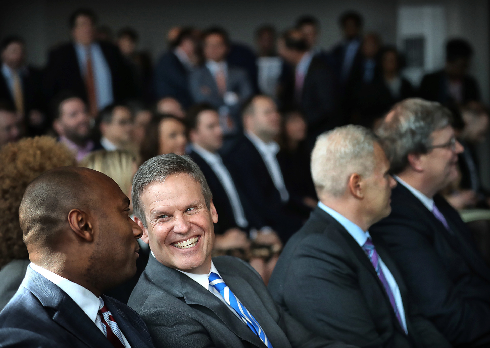 <strong>Tennessee Gov. Bill Lee jokes with Shelby County Mayor Lee Harris (left) during a press conference on Feb. 12, 2019, to announce that FedEx Logistics will be moving into the former Gibson Guitar Factory in Downtown Memphis.</strong> (Jim Weber/Daily Memphian)