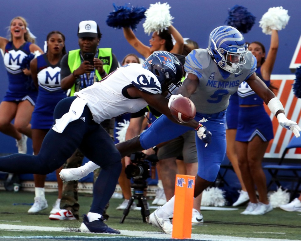 <strong>University of Memphis running back Gabriel Rogers (9) dives for the pylon during Saturday&rsquo;s game against University of Texas San Antonio.</strong> (Patrick Lantrip/Daily Memphian)