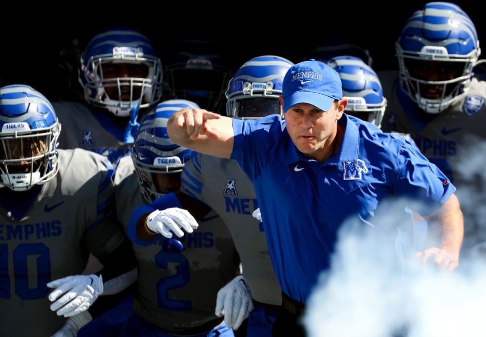 <strong>&nbsp;&ldquo;One game is not going to define our season,&rdquo; head coach Ryan Silverfield said. &ldquo;We have all of our hopes, goals and dreams still in front of us.&rdquo; Silverfield runs on the field with the team before Saturday&rsquo;s game at Liberty Bowl Memorial Stadium.</strong> (Patrick Lantrip/Daily Memphian)