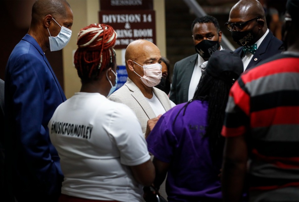 <strong>Alvin Motley Sr. (middle) is surrounded by family and friends before a preliminary hearing in Shelby County General Sessions&nbsp;Judge Louis Montesi&rsquo;s courtroom on Tuesday, Sept. 28.</strong> (Mark Weber/Daily Memphian)