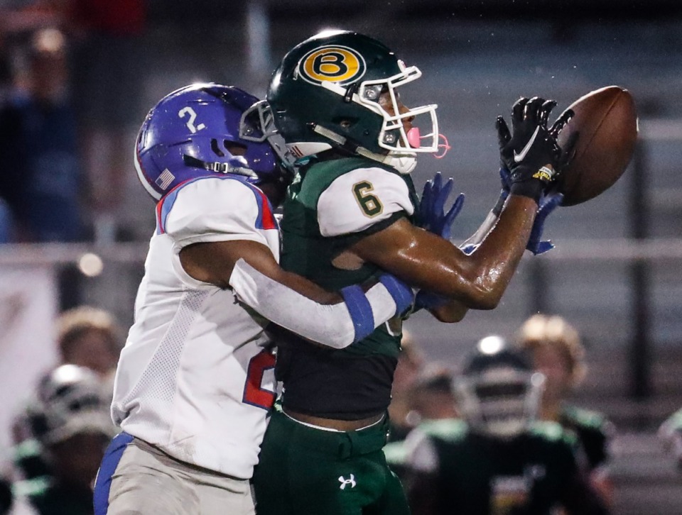 <strong>MUS defender Malcolm Shaw (left) is called for pass interference against Briarcrest receiver Devin Johnson (right) on Friday, Oct. 1, 2021.</strong> (Mark Weber/The Daily Memphian)