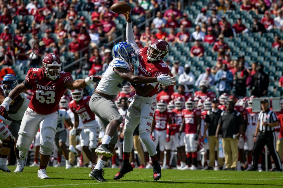 <strong>Wardalis Ducksworth (97) of the Memphis Tigers tackles D'Wan Mathis (18) of the Temple Owls during the game at Lincoln Financial Field on Oct. 2, 2021 in Philadelphia.</strong> (Kate Frese/Special to The Daily Memphian)