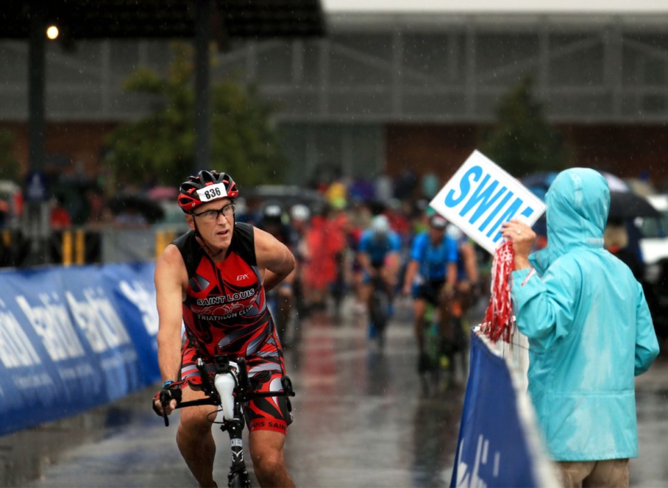 <strong>Marie Weber (right) cheers on the bikers during the St.Jude IRONMAN 70.3 Memphis race at Shelby Farms Oct. 2, 2021.</strong> (Patrick Lantrip/Daily Memphian)