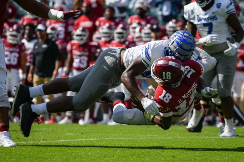 <strong>Wardalis Ducksworth (97) of the Memphis Tigers tackles D'Wan Mathis (18) of the Temple Owls during the game at Lincoln Financial Field on Oct. 2, 2021 in Philadelphia.</strong> (Kate Frese)