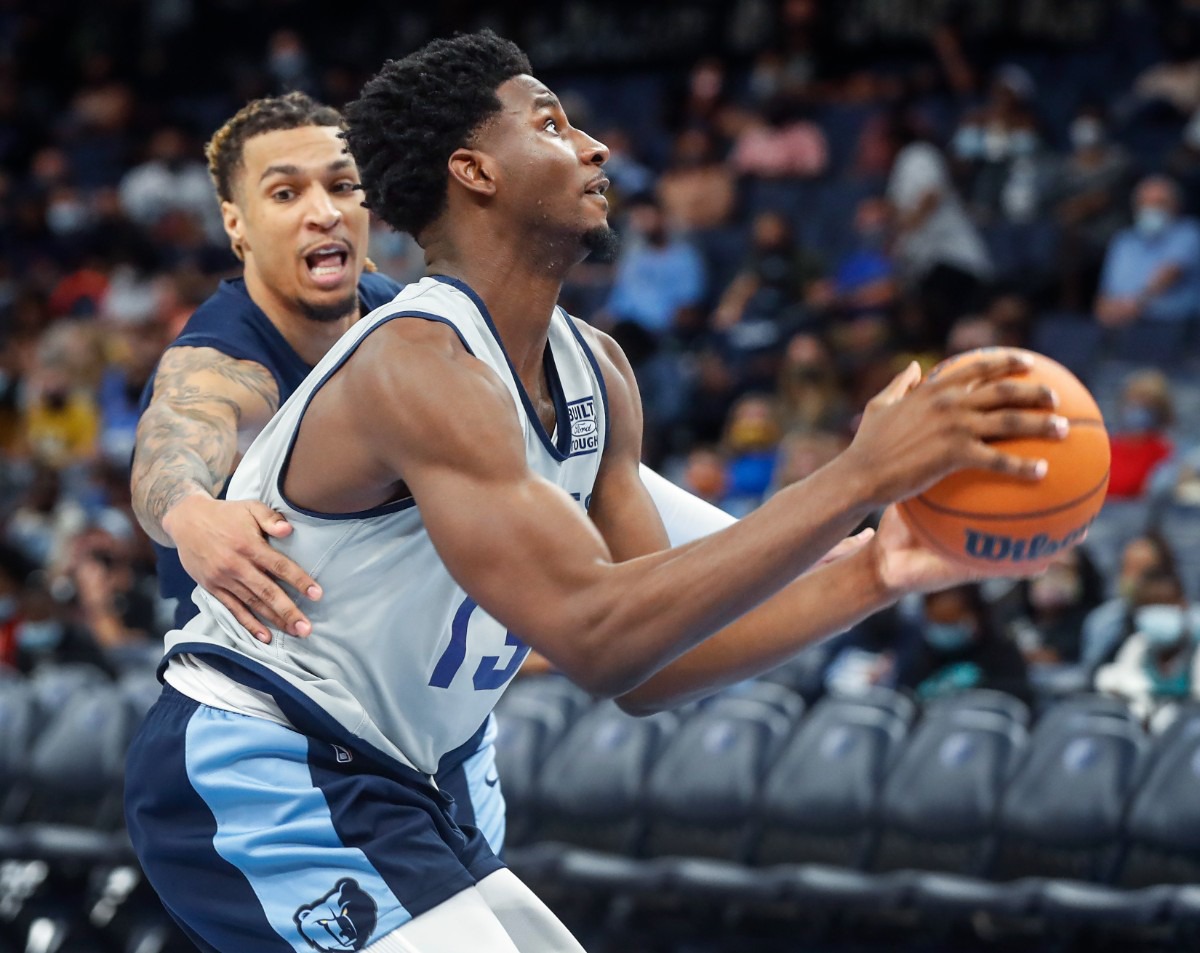 <strong>Memphis Grizzlies center Jaren Jackson Jr. (right) drives the lane in front of teammate Brandon Clarke (left) during open practice on Sunday, Oct. 3, 2021.</strong> (Mark Weber/The Daily Memphian)