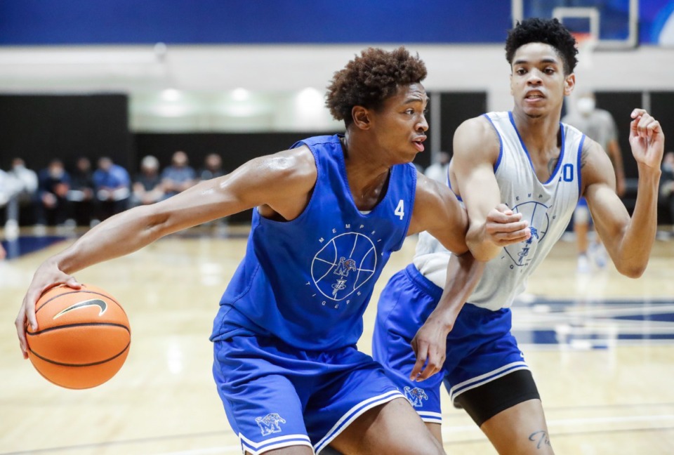 <strong>Memphis Tigers guard Chandler Lawson (left) drives the lane against forward Josh Minott (right) during Pro Day on Wednesday, Oct. 6, 2021.</strong> (Mark Weber/The Daily Memphian)