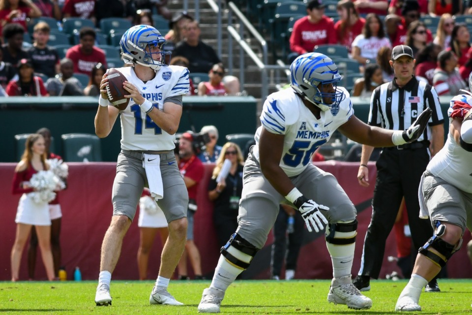 <strong>Memphis quarterback Seth Henigan looks to pass against Temple at Lincoln Financial Field in Philadelphia on Saturday, Oct. 2. The Tigers lost the matchup, 34-31.</strong> (Kate Frese/Daily Memphian file)