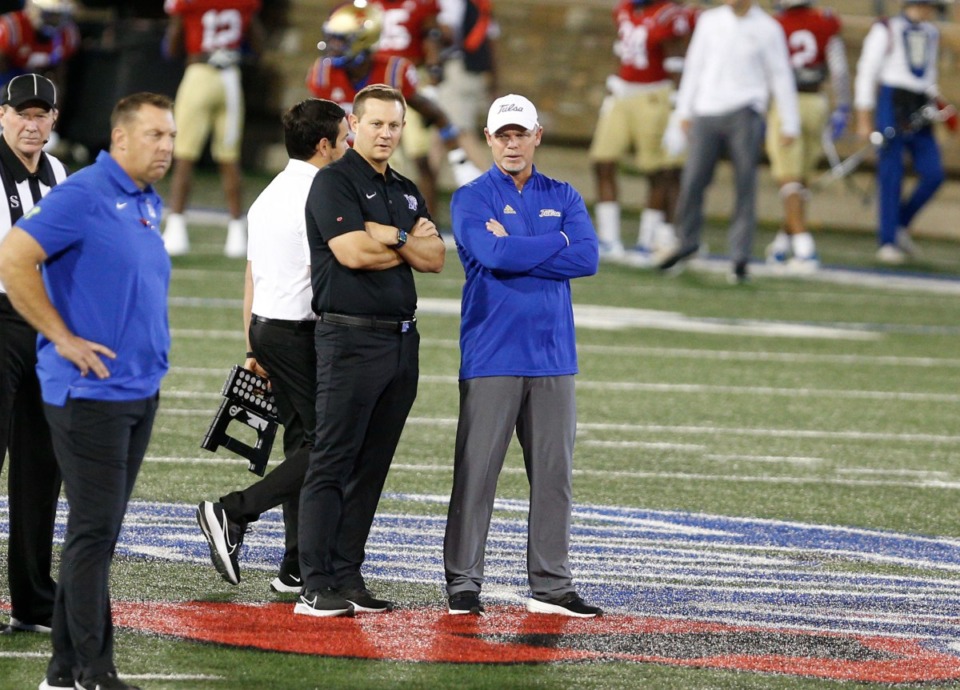 <strong>Memphis Tigers head coach Ryan Silverfield and Tulsa Golden Hurricane head coach Philip Montgomery (right) visit before the game in Tulsa on Saturday, Oct. 9.</strong> (Joey Johnson/Special to the Daily Memphian)