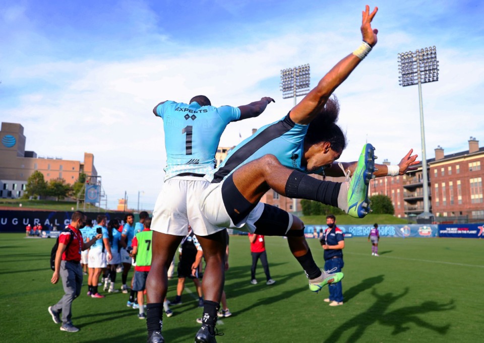 <strong>Experts' Dave Hightower (1) and Corey Jones (3) celebrate after winning the Premier Rugby Sevens Inaugural Championship at AutoZone Park</strong>&nbsp;<strong>on Saturday, Oct. 9.</strong>&nbsp;(Patrick Lantrip/Daily Memphian)