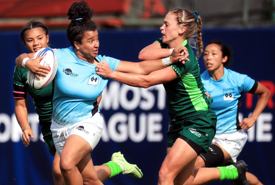 <strong>Experts' Kaitlyn Broughton (left) holds off the opposition during the Premier Rugby Sevens Inaugural Championship at AutoZone Park</strong>&nbsp;<strong>on Saturday, Oct. 9.</strong> (Patrick Lantrip/Daily Memphian)