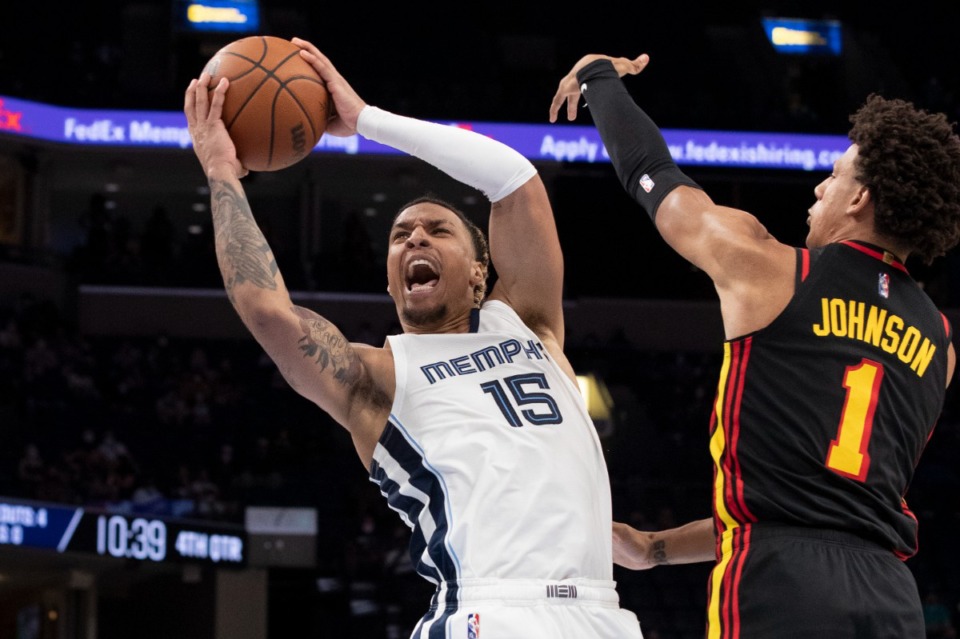 <strong>Grizzlies guard Brandon Clarke shoots as he&rsquo;s defended by Atlanta Hawks forward Jalen Johnson at FedExForum on Saturday, Oct. 9.</strong> (Nikki Boertman/Associated Press)