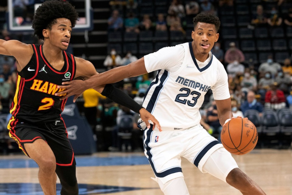 <strong>Memphis Grizzlies guard Jarrett Culver drives to the basket against Atlanta Hawks guard Sharife Cooper at FedExForum on Saturday, Oct. 9.</strong> (Nikki Boertman/Associated Press)