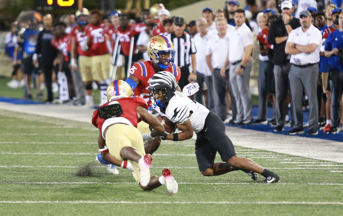 Memphis Tigers wide receiver Calvin Austin grinded from walk-on to  first-team All-AAC at his hometown school, College Football