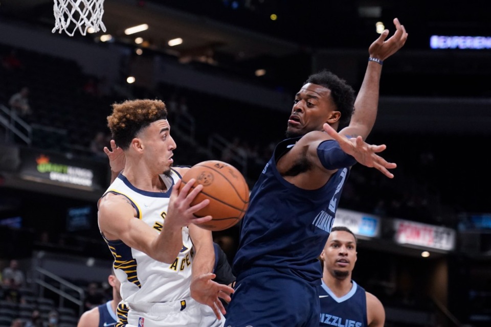 <strong>Grizzlies' Xavier Tillman Sr. blocks Indiana&rsquo;s Chris Duarte (3) from passing on Oct. 13 in Indianapolis.</strong> (Darron Cummings/AP)