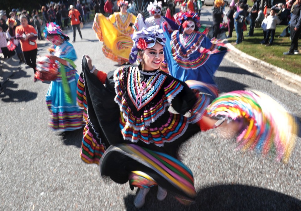 <strong>In 2018, the Brooks Museum of Art and Cazateatro Bilingual Theatre Group hosted a Dia de los Muertos event in Overton Park with dancers from Herencia Hispana.</strong> (Jim Weber/Daily Memphian file)