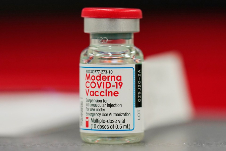 <strong>The iinitial Moderna vaccination consists of two 100-microgram shots. But Moderna says a single 50-microgram shot should be enough for a booster.</strong> (AP Photo/David Zalubowski, File)