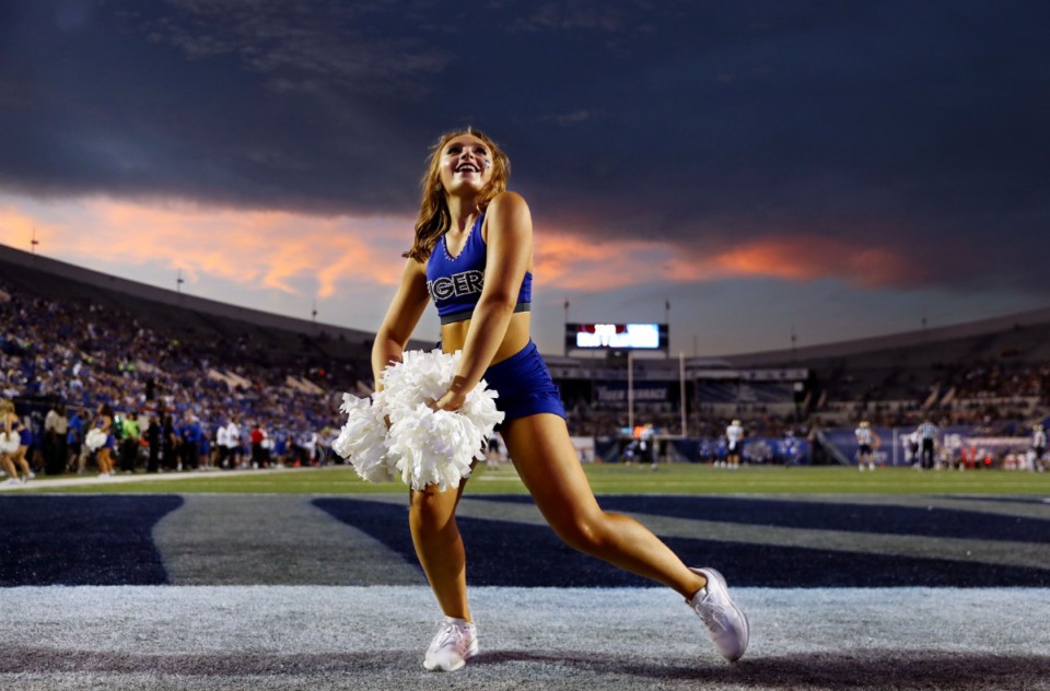 <strong>A University of Memphis cheerleader revs up the crowd up before the Oct. 14 game against Navy at the Liberty Bowl.</strong> (Patrick Lantrip/Daily Memphian)