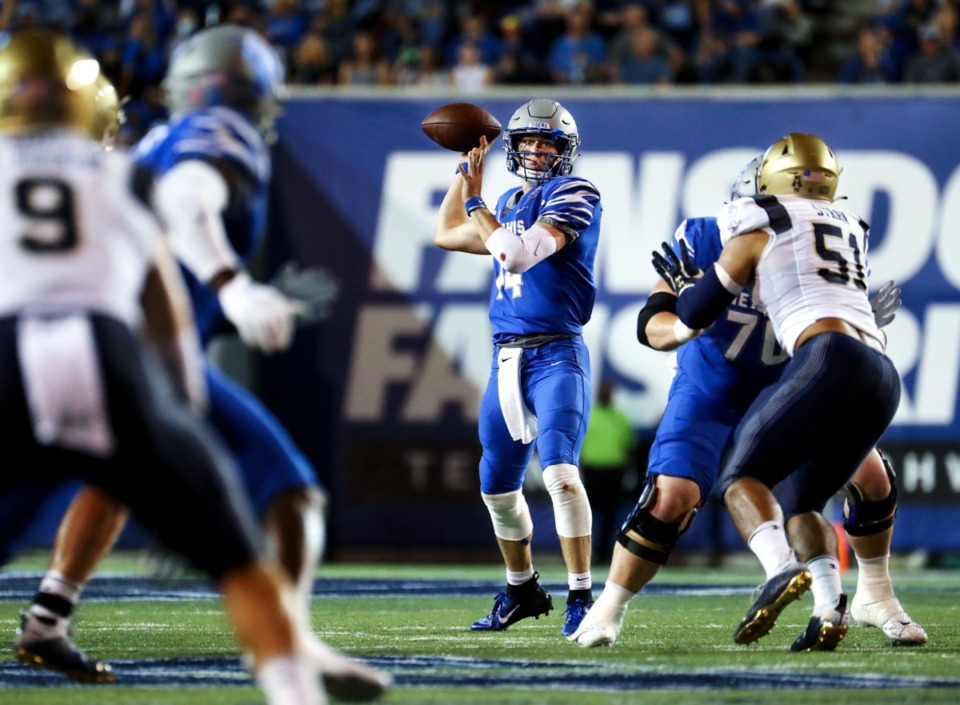 <strong>University of Memphis quarterback Seth Henigan (14) looks for an open receiver on Oct. 14 in the game against Navy at the Liberty Bowl.</strong> (Patrick Lantrip/Daily Memphian)