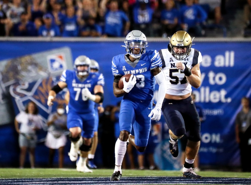 <strong>University of Memphis receiver (13) Javon Ivory breaks off a long run during the Oct. 14 game against Navy at the Liberty Bowl.</strong> (Patrick Lantrip/Daily Memphian)