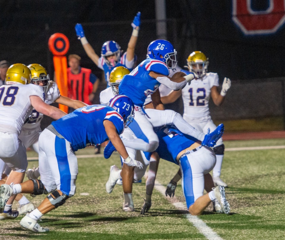 <strong>MUS running back Hunter Barnes crosses over the goal line for his second running touchdown of the night in the crosstown rivalry with CBHS on Friday, Oct. 15, 2021.</strong> (Greg Campbell/Special to The Daily Memphian)
