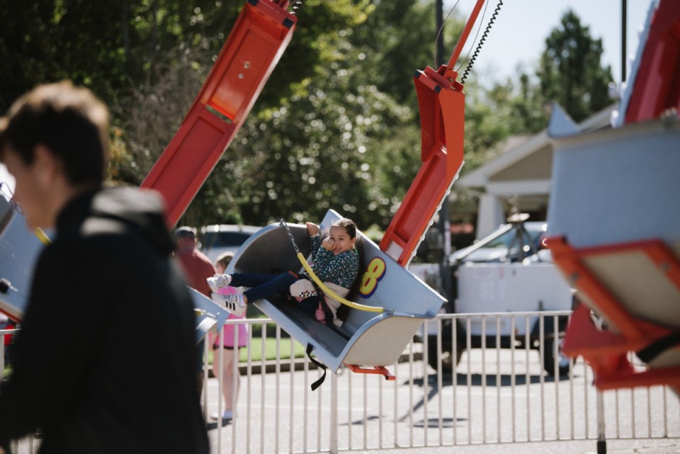 <strong>Carnival rides add excitement to the St. Ann Fall Fest at St. Ann Catholic Church in Bartlett, Saturday, Oct. 16, 2021.</strong> (Lucy Garrett/Special to The Daily Memphian)