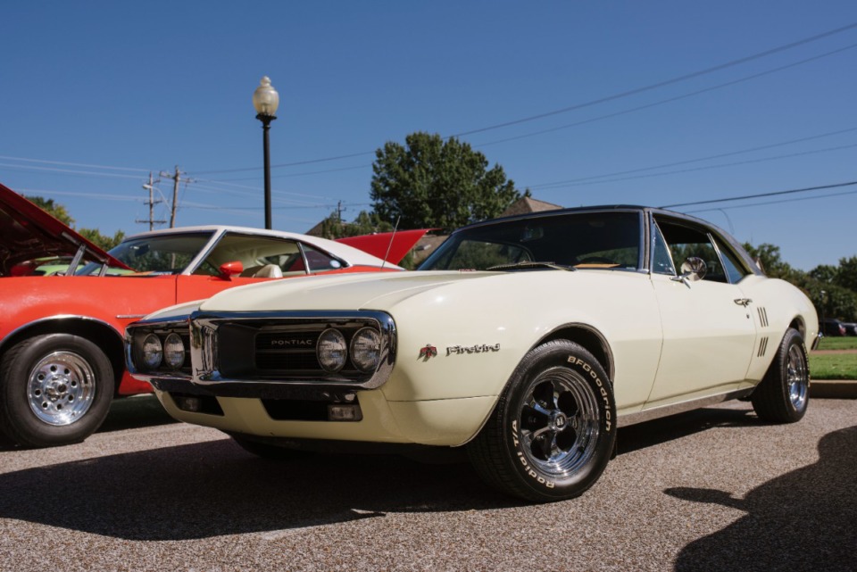 <strong>A '67 Pontiac Firebird, owned by John Romancik is among the cars displayed at St Ann Fall Festival in Bartlett, Saturday, Oct. 16, 2021.</strong> (Lucy Garrett/Special to The Daily Memphian)