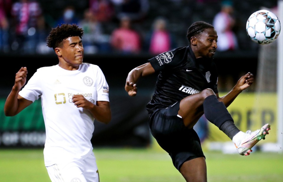 <strong>Memphis 901 FC defender Mark Segbers (2) clears the ball during an Oct. 16, 2021 game at AutoZone Park against Atlanta United 2.</strong> (Patrick Lantrip/Daily Memphian)