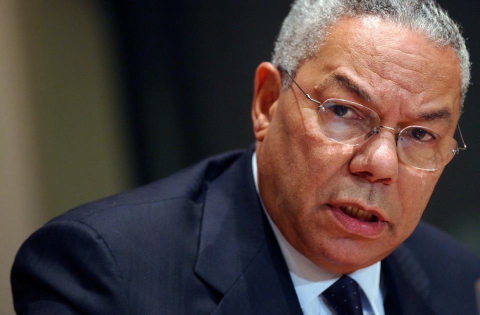 <strong>Former Joint Chiefs chairman and U.S. Secretary of State Colin Powell (in a 2003 photo) has died from COVID-19 complications at age 84. In an announcement on social media Monday, Oct. 18, 2021 the family said Powell had been fully vaccinated.</strong> (AP Photo/Mary Altaffer)