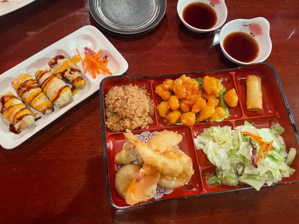 <strong>Dynamite tuna (left) and a lunch bento with shrimp tempura and General Tso&rsquo;s chicken makes lunch for two.</strong> (Jennifer Biggs/The Daily Memphian)