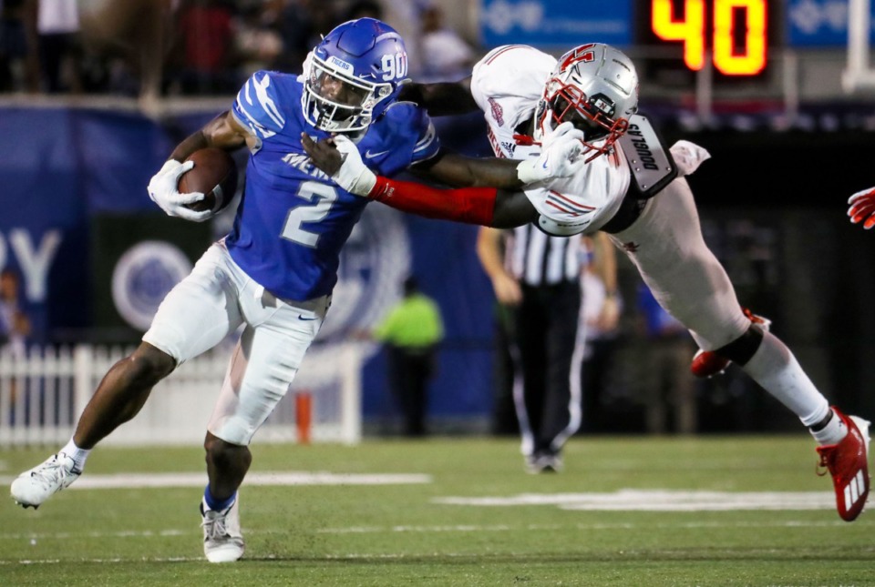 <strong>University of Memphis dunning back Rodrigues Clark (2) breaks a tackle during a Sept. 4, 2021 game against Nicholls State at Liberty Bowl Memorial Stadium.</strong> (Patrick Lantrip/Daily Memphian)