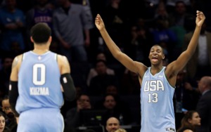 <span><strong>U.S. Team's Jaren Jackson Jr., of the Memphis Grizzlies, celebrates late in the NBA All-Star Rising Stars basketball game against the World Team, Friday, Feb. 15, in Charlotte, N.C. The U.S. Team won 161-144.</strong> (Chuck Burton/Associated Press)</span>