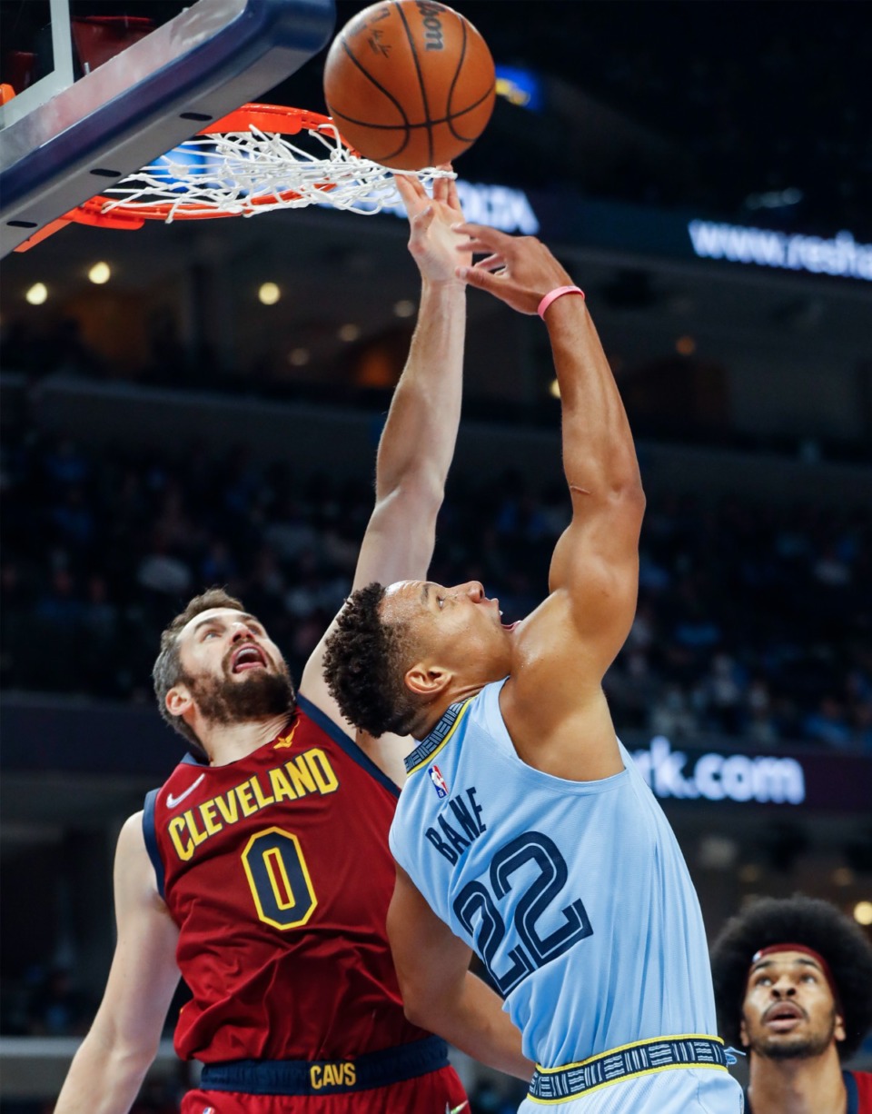 <strong>Grizzlies guard Desmond Bane (right) drives for a layup against Cleveland&rsquo;s Kevin Love (left) don Wednesday, Oct. 20, 2021.</strong> (Mark Weber/The Daily Memphian)