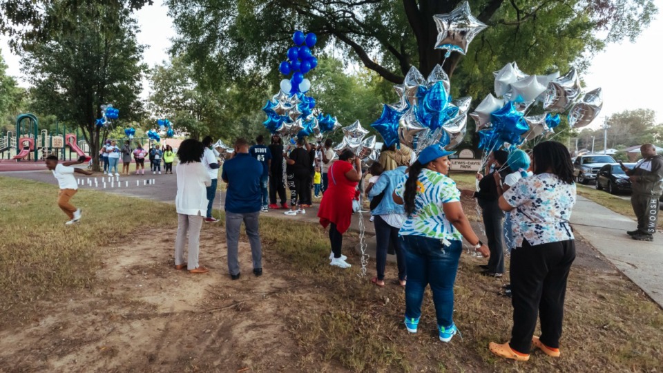<strong>Various friends, family and co-workers gather for the vigil of slain USPS employee Demetria Dortch at Lewis-Davis Park in Orange Mound on Oct. 20, 2021.</strong> (Ziggy Mack/Special to The Daily Memphian)