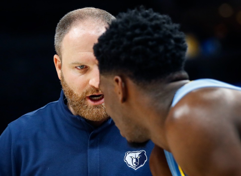 <strong>Grizzlies head coach Tyler Jenkins (left) chats instructs Jaren Jackson Jr. (right) in the game against the Cleveland Cavaliers on Wednesday, Oct. 20, 2021.</strong> (Mark Weber/The Daily Memphian)